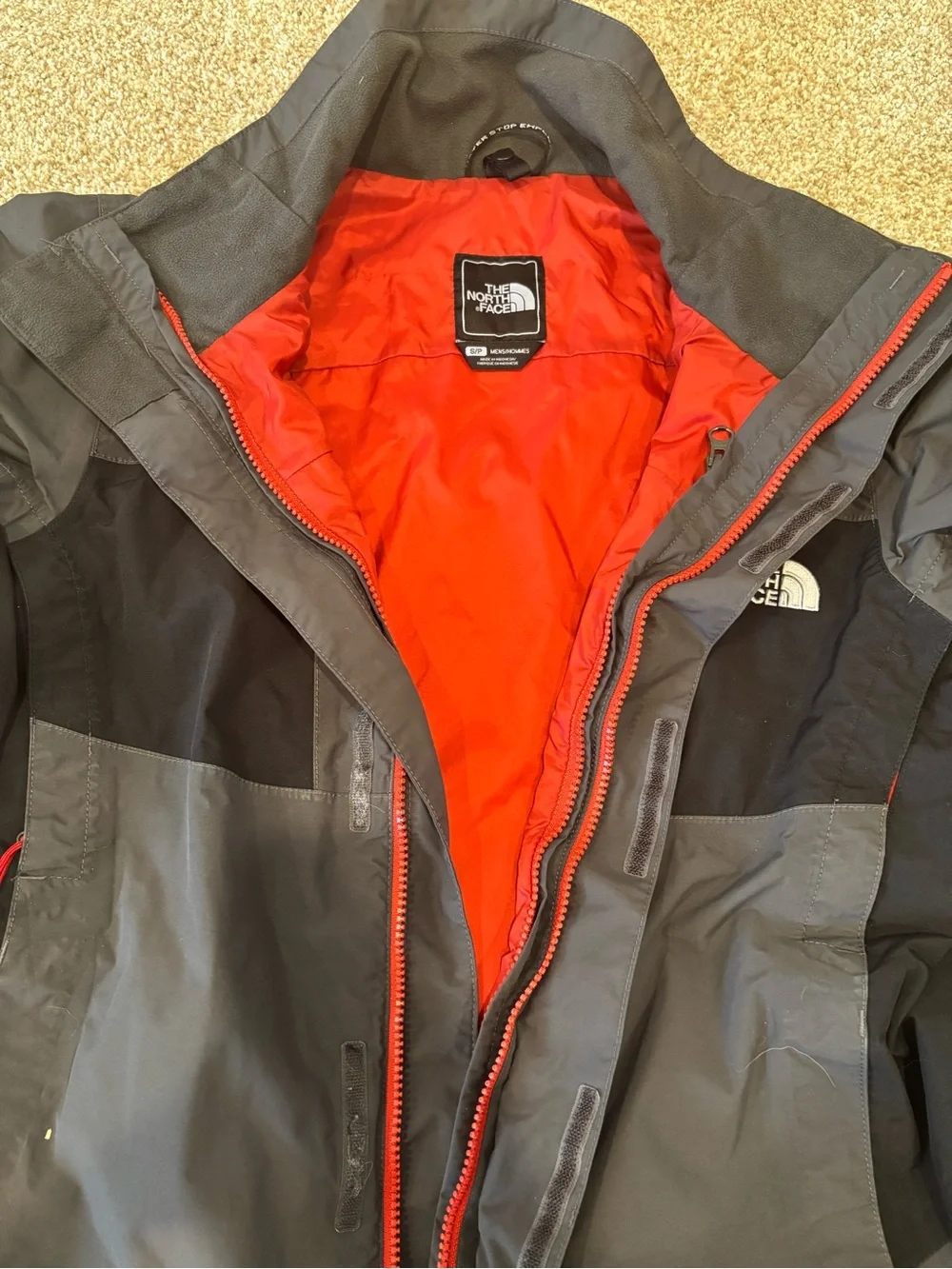 The North Face Men's Gray and Black Raincoat with Red Accents